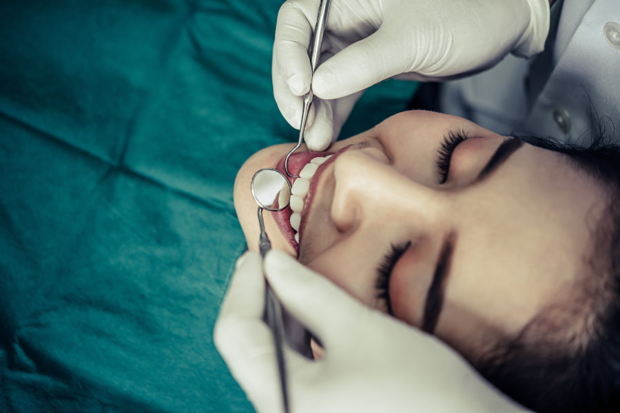 Dentists treat patients' teeth.